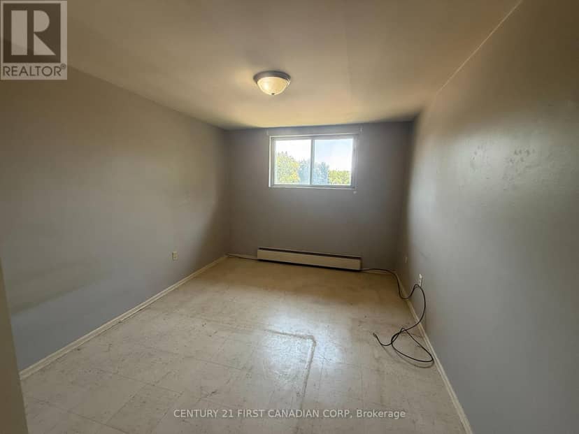 304 - 1830 Dumont Street — photo 12 of 14