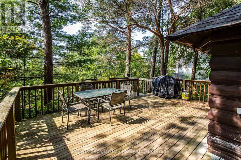 68 Tiny Beaches Road S — photo 1 of 38