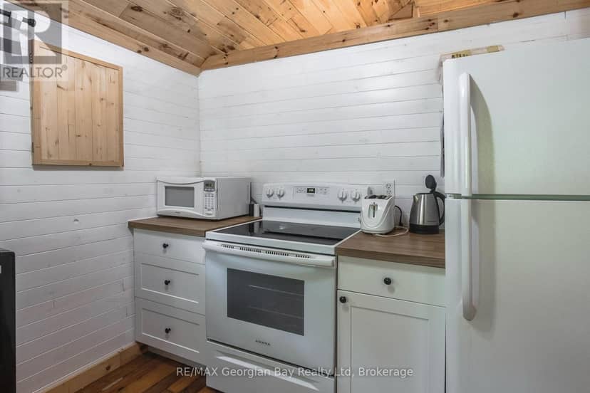 68 Tiny Beaches Road S — photo 14 of 38