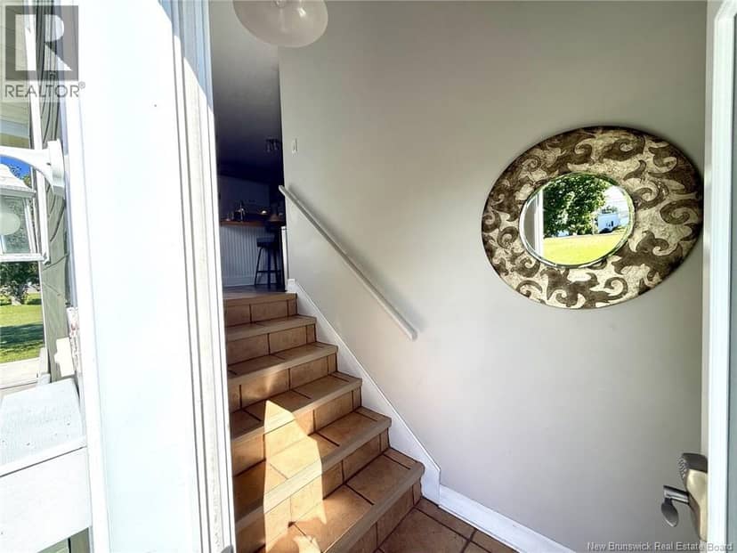 8203 Rue St-Paul — photo 11 of 35