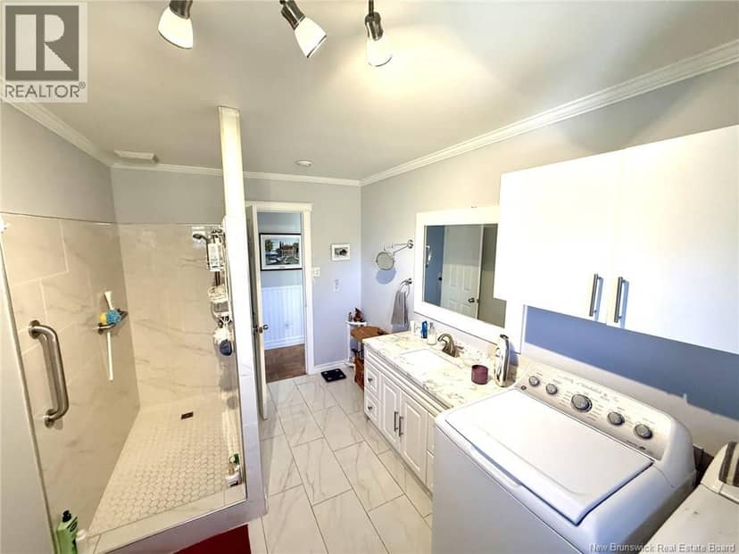 8203 Rue St-Paul — photo 28 of 35