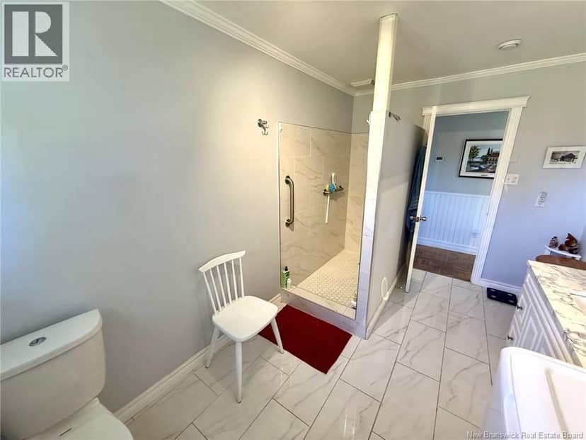 8203 Rue St-Paul — photo 30 of 35