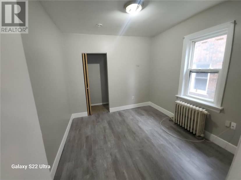 335 Frood Road — photo 4 of 8