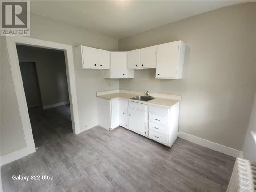 335 Frood Road — photo 5 of 8