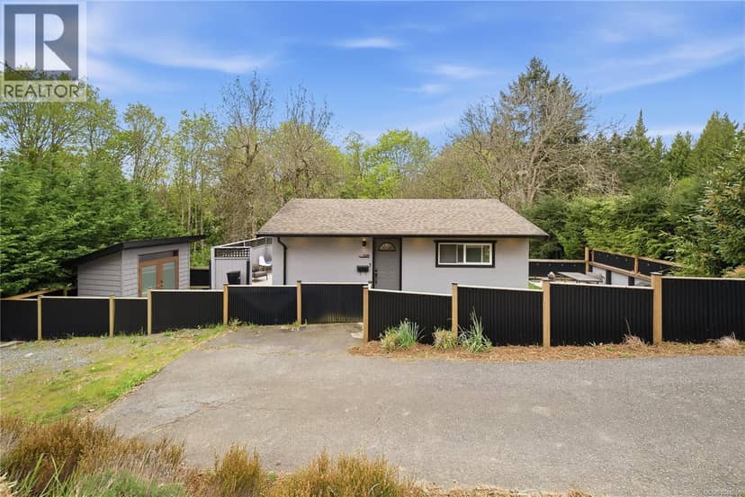 3129 Departure Bay Rd — photo 1 of 34