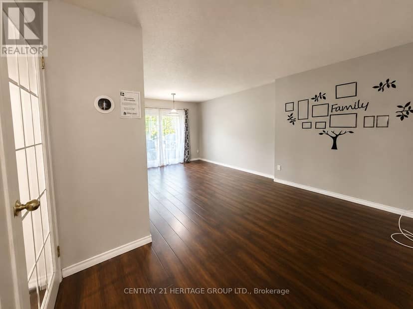 7 - 441 Barrie Road — photo 4 of 20