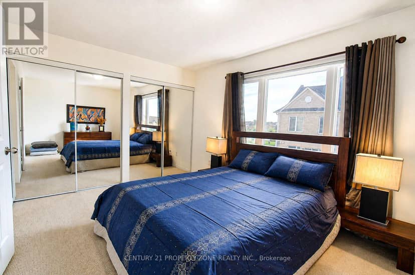 12 - 5035 Oscar Peterson Boulevard — photo 19 of 27