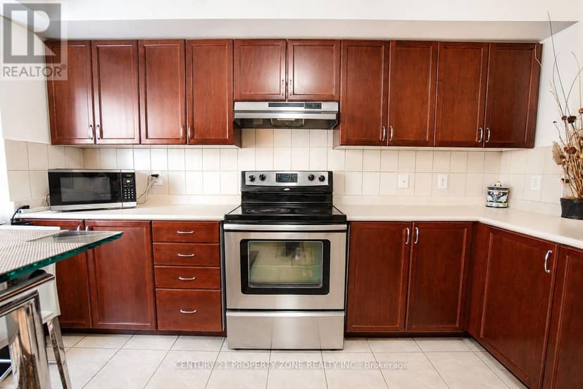 12 - 5035 Oscar Peterson Boulevard — photo 9 of 27