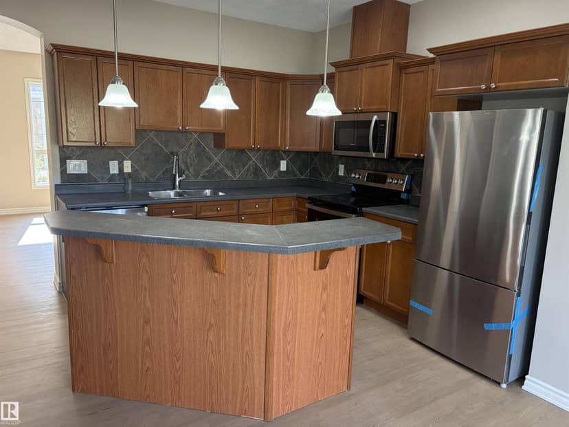 #100 13825 155 AV NW — photo 10 of 31