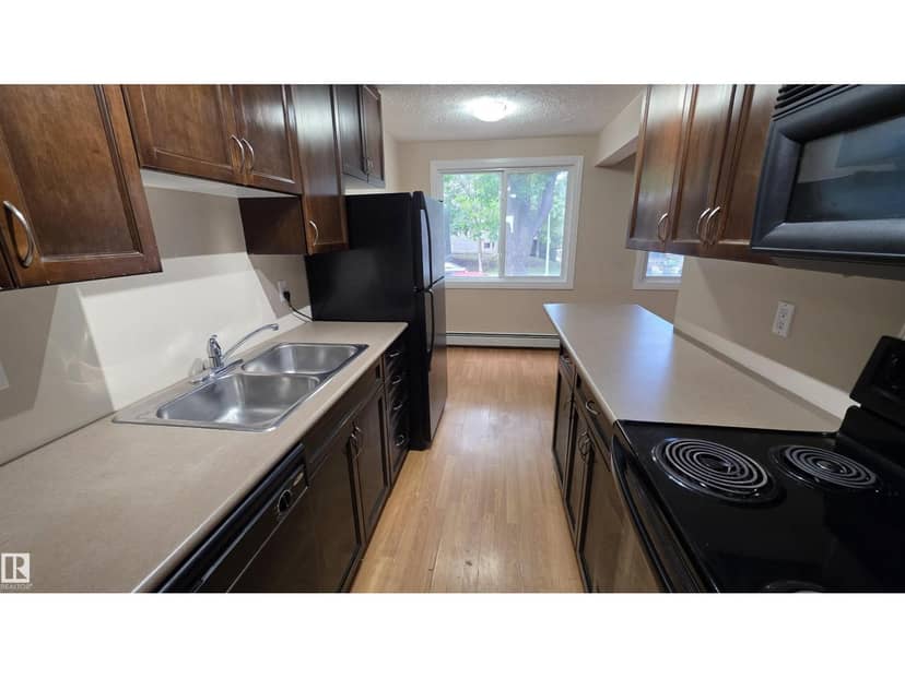 #207 10415 93 ST NW NW — photo 9 of 28