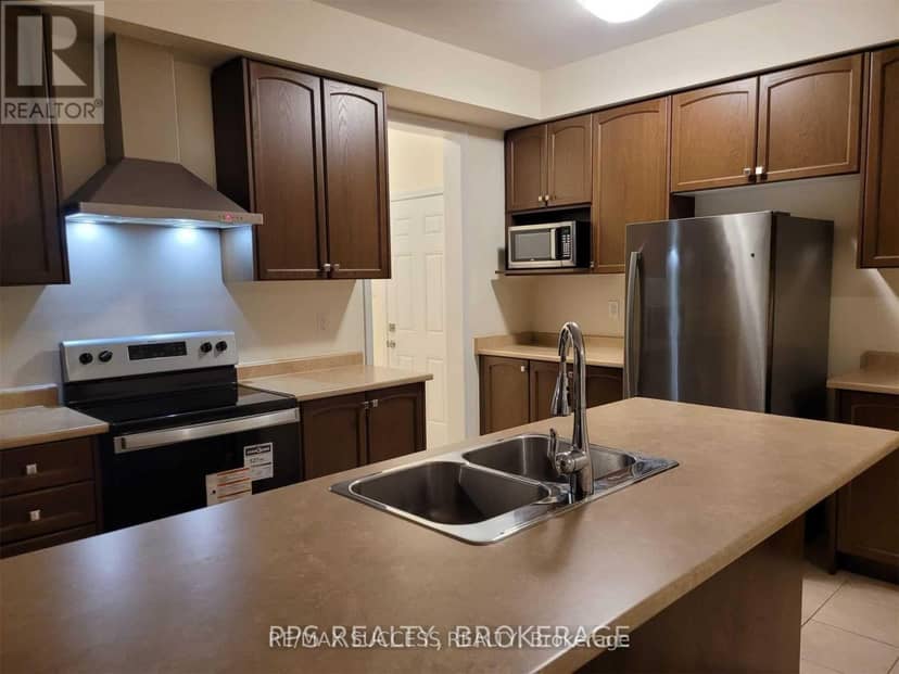 7916 Odell Crescent — photo 9 of 40