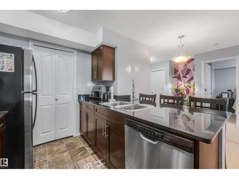 #408 1070 Macconachie Bv NW NW — photo 11 of 40