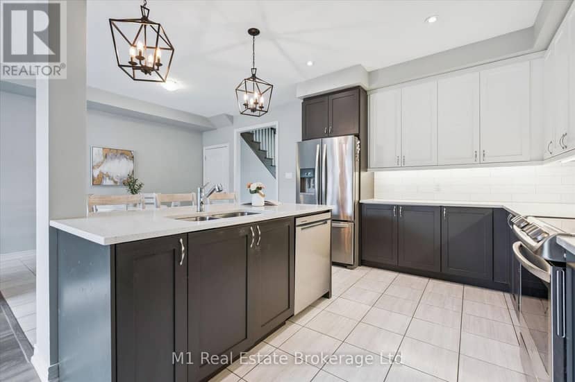 3 - 65 Elliot Avenue E — photo 11 of 40