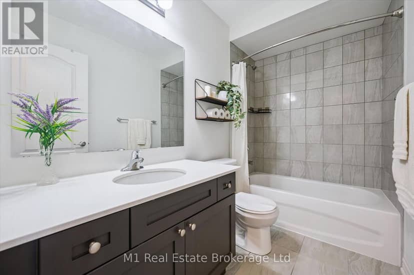 3 - 65 Elliot Avenue E — photo 25 of 40