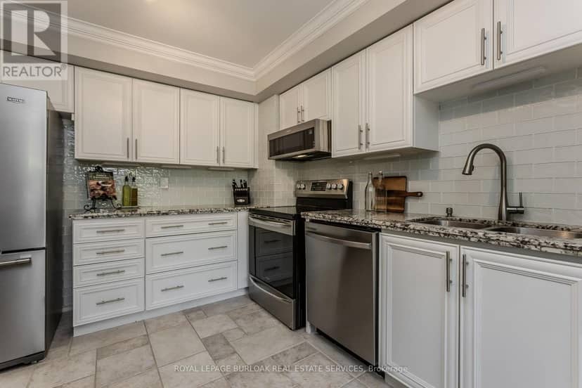 9 - 5411 Lakeshore Road — photo 9 of 39