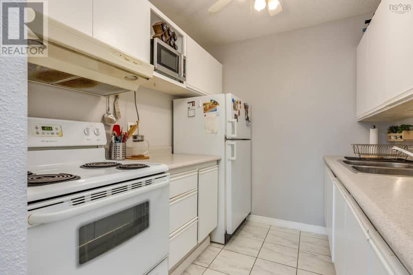 202 5572 North Ridge Road — photo 9 of 31