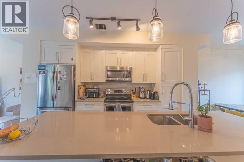 102, 1106 Bow Valley Trail, Canmore, photo 7