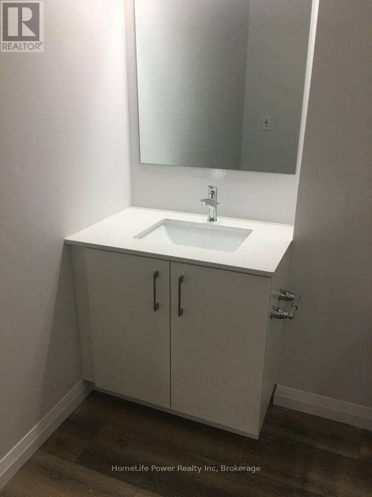 605 - 104 Garment Street — photo 24 of 38