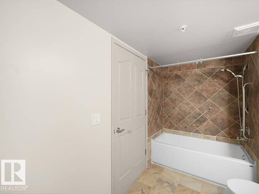 #302 1589 Glastonbury Bv NW — photo 18 of 38