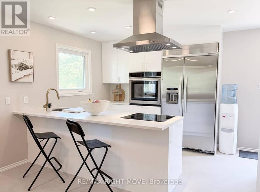 8020 Park Lane Crescent — photo 4 of 34