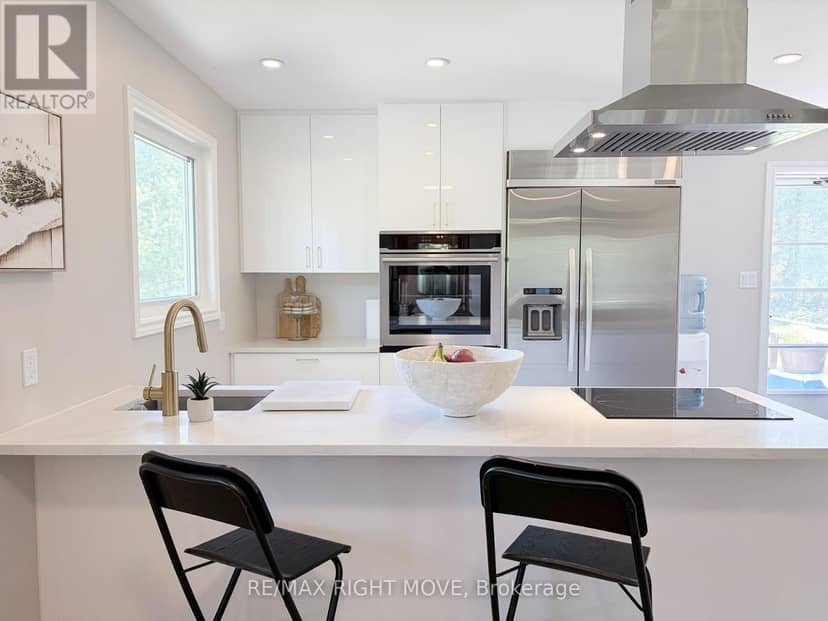 8020 Park Lane Crescent — photo 5 of 34