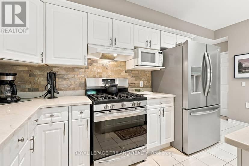 7 - 1337 Commissioners Road W — photo 10 of 32