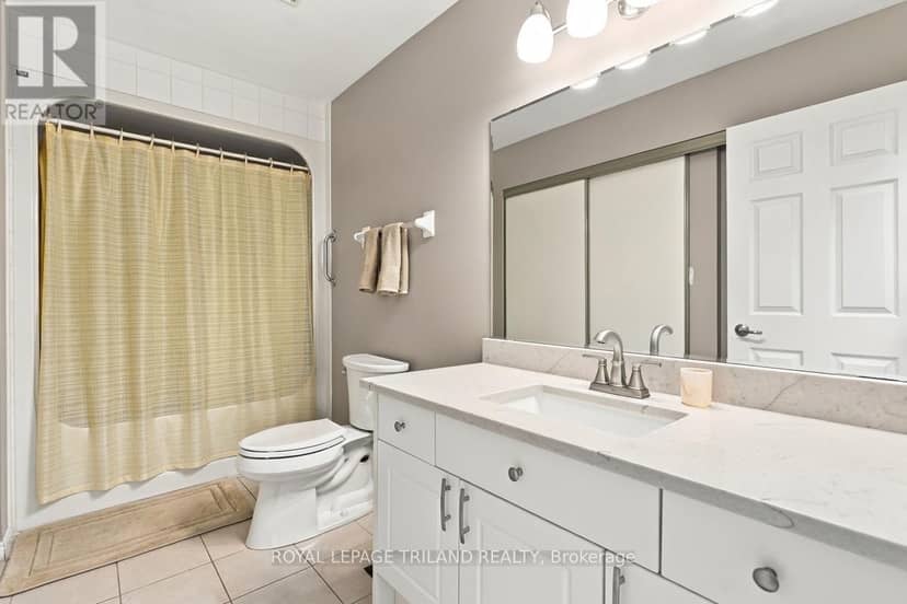 7 - 1337 Commissioners Road W — photo 6 of 32