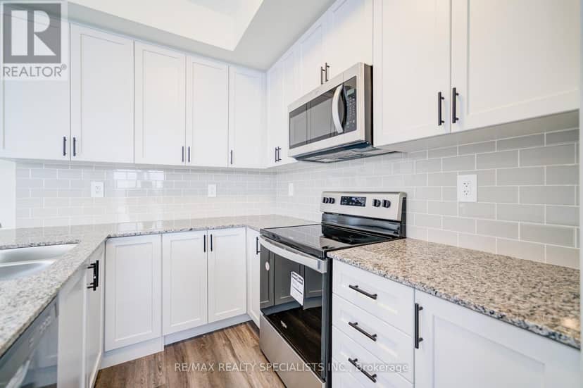 108 - 1573 Rose Way — photo 14 of 39