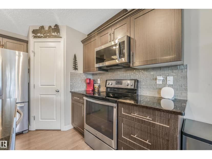 2397 Sparrow Cr NW — photo 23 of 40