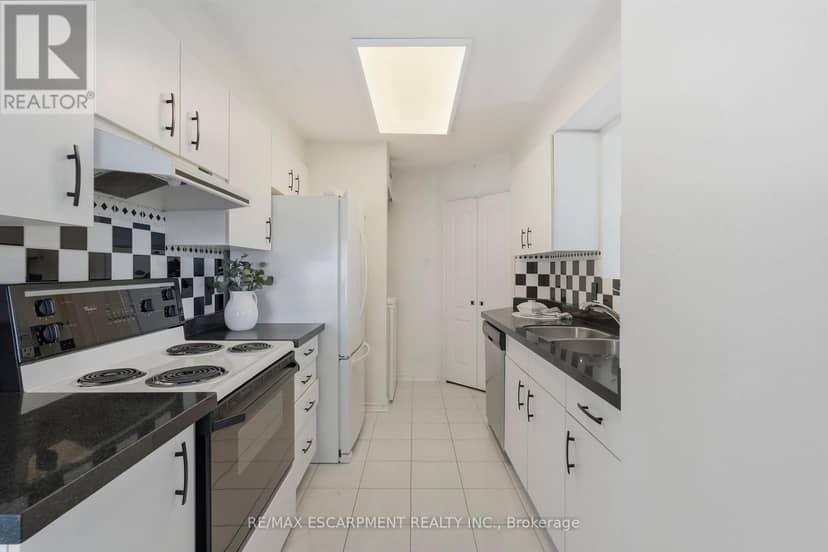 403 - 100 Millside Drive — photo 19 of 37