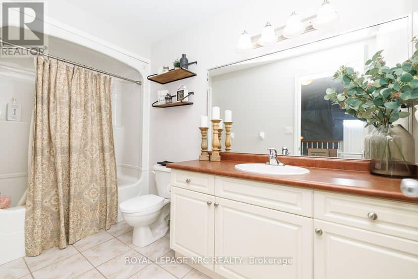 9 - 8142 Costabile Drive — photo 24 of 33