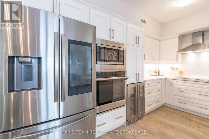 410 - 54 Koda Street — photo 10 of 38