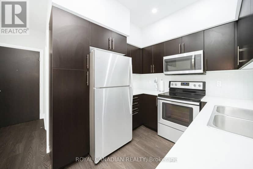 308 - 55 Speers Road — photo 16 of 40