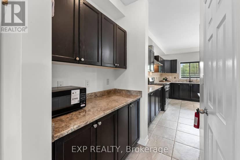 8876 Tristar Crescent — photo 12 of 40