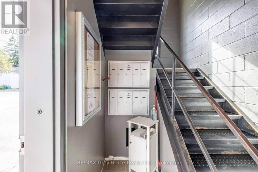 303 - 110 Sykes Street N — photo 18 of 23