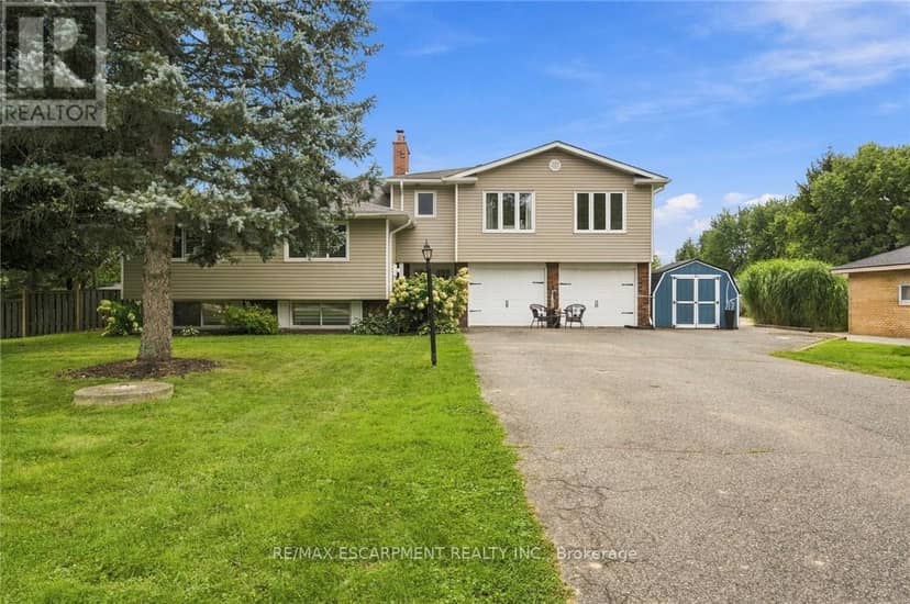 9793 Dickenson Road W — photo 2 of 40