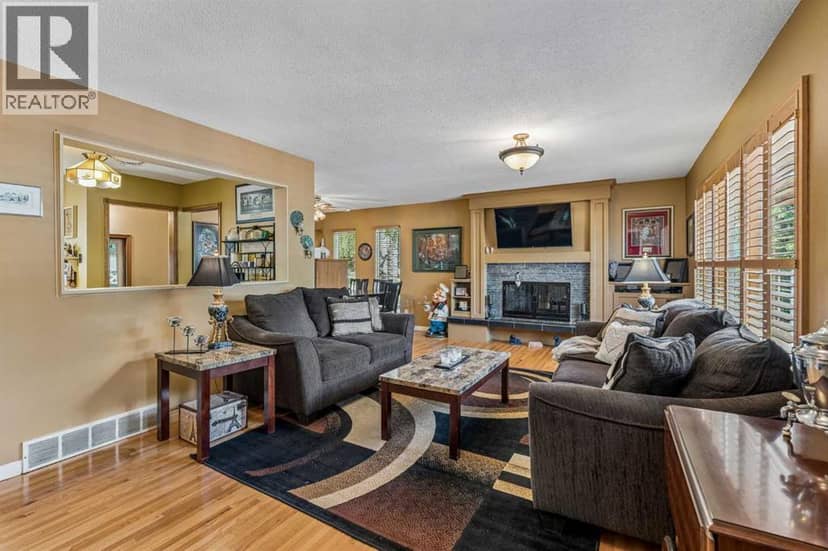 708 Lake Bonavista Drive SE — photo 9 of 40