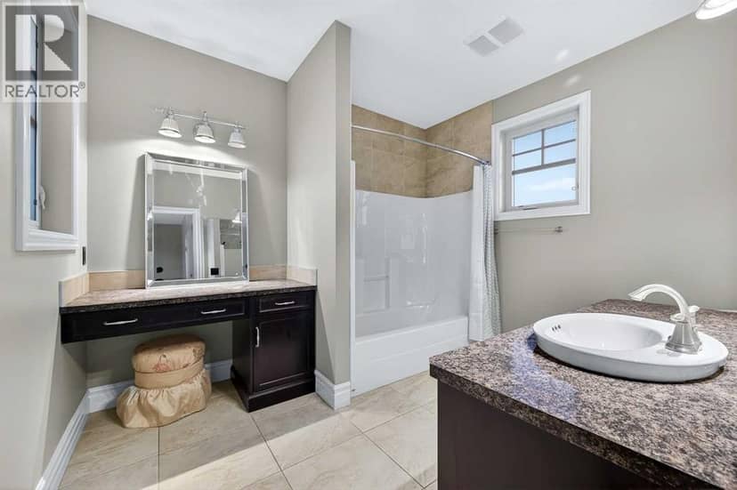 100, 240117 210 Avenue W — photo 30 of 40