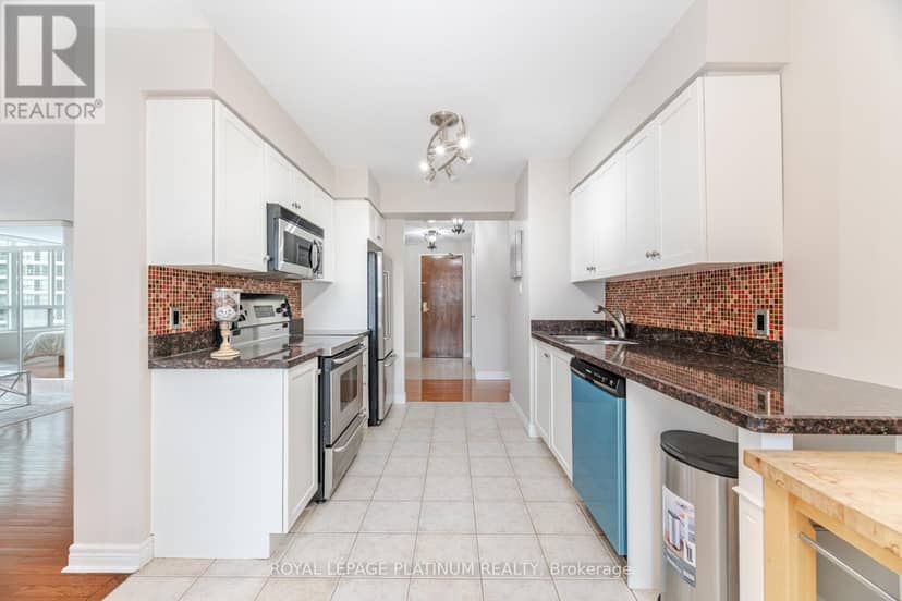 703 - 156 Enfield Place — photo 6 of 40