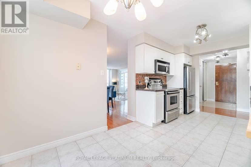 703 - 156 Enfield Place — photo 8 of 40
