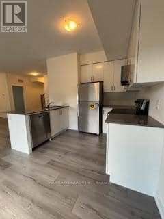 902 - 1695 Dersan Street — photo 4 of 15