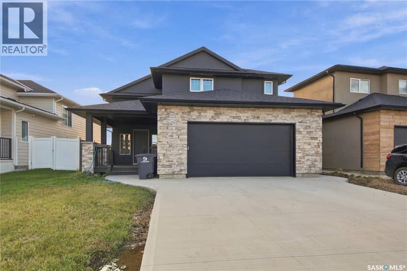 207 Greyeyes-Steele WAY — photo 1 of 40