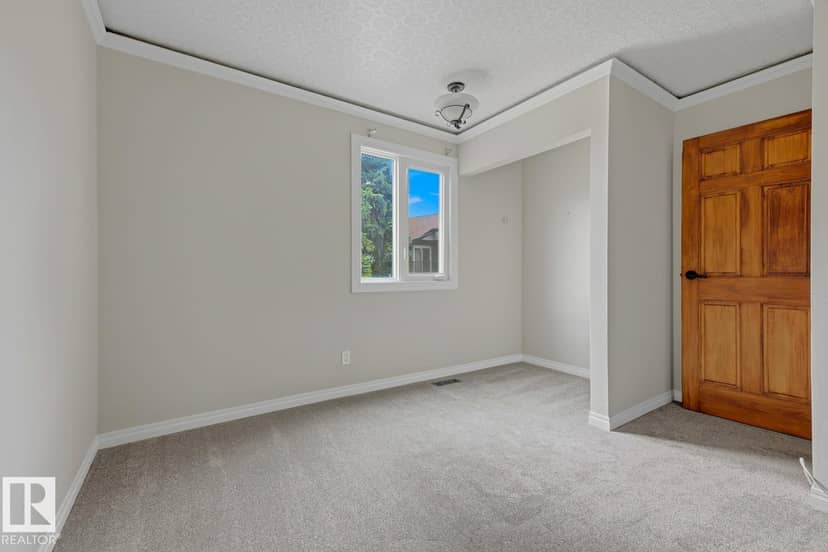 10621 Beaumaris Rd NW — photo 37 of 40