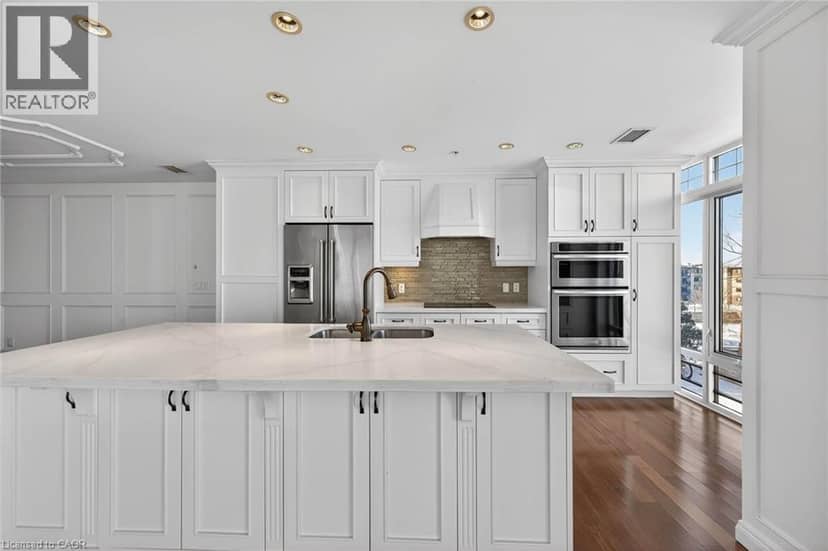 205 LAKESHORE Road W Unit# 409 — photo 10 of 40