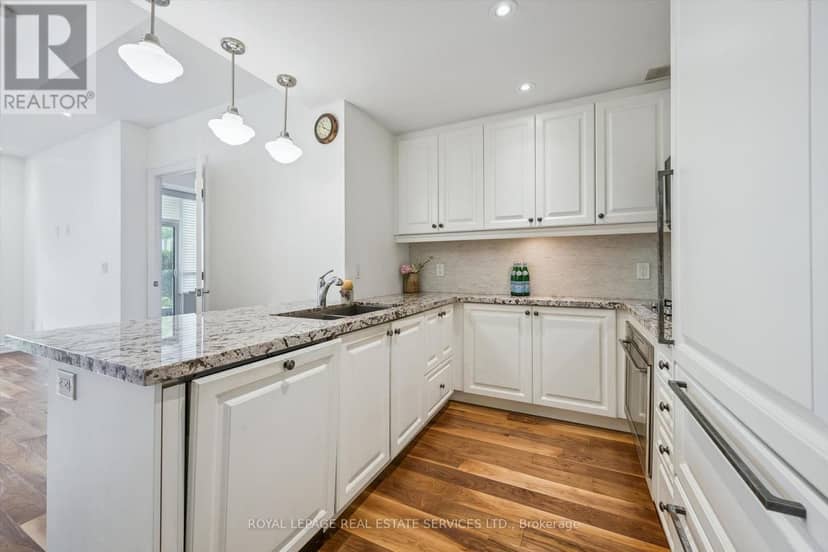 122C - 3500 Lakeshore Road W — photo 11 of 40