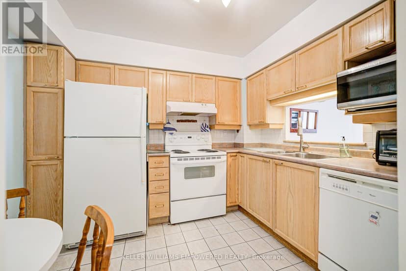 410 - 115 Bonis Avenue — photo 22 of 31