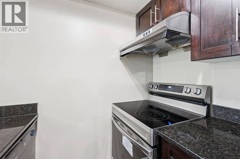 2117, 403 Mackenzie Way SW — photo 15 of 29
