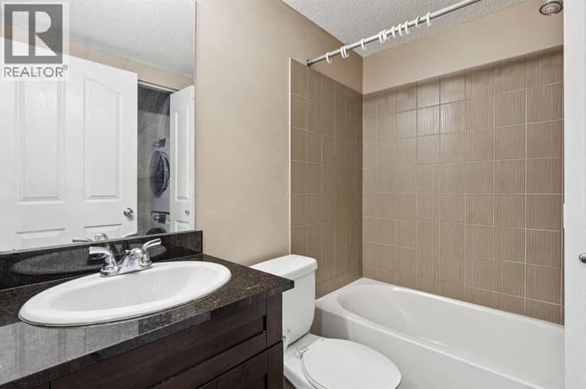 2117, 403 Mackenzie Way SW — photo 16 of 29