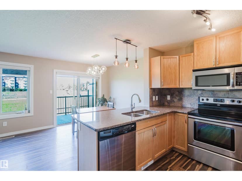 #106 5420 Grant Macewan Bv — photo 10 of 39