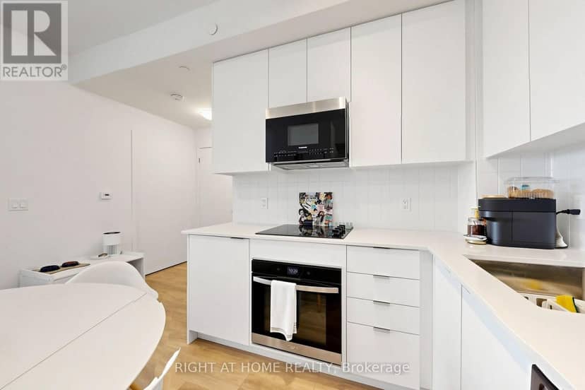 909 - 474 Caldari Road — photo 14 of 40